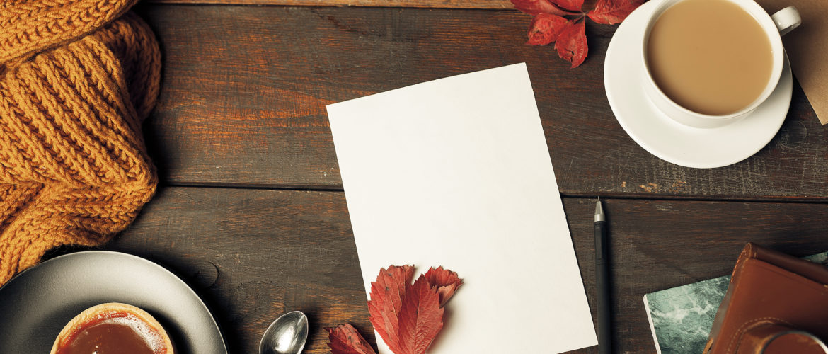 Blank paper on a table in fall