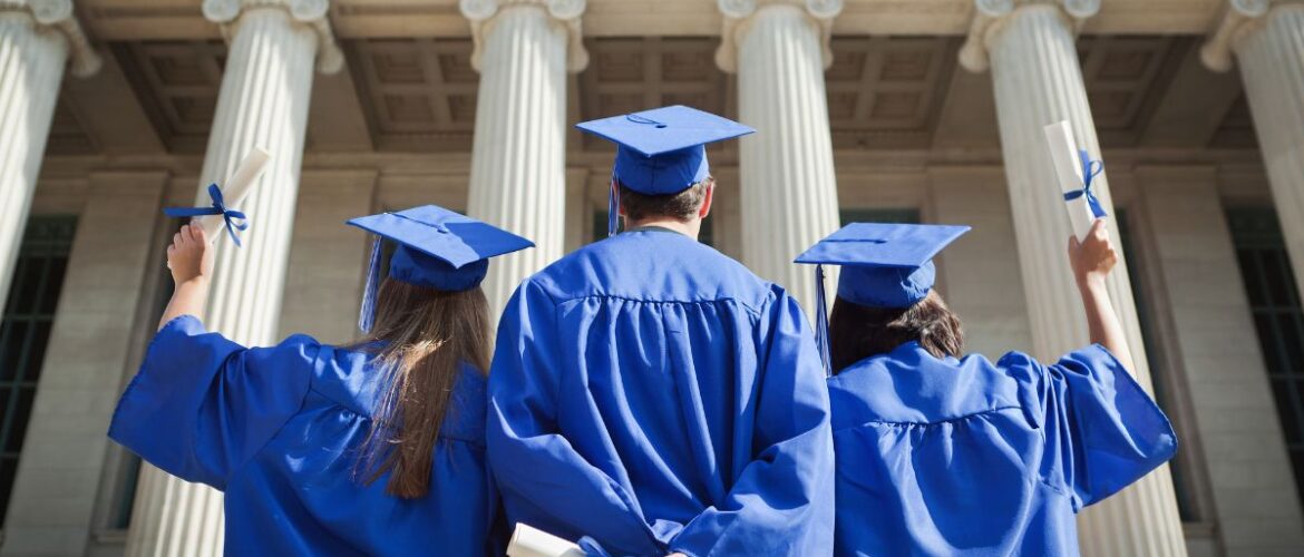 Students in blue caps and gowns at high school graduations prepped with college and career readiness lessons.